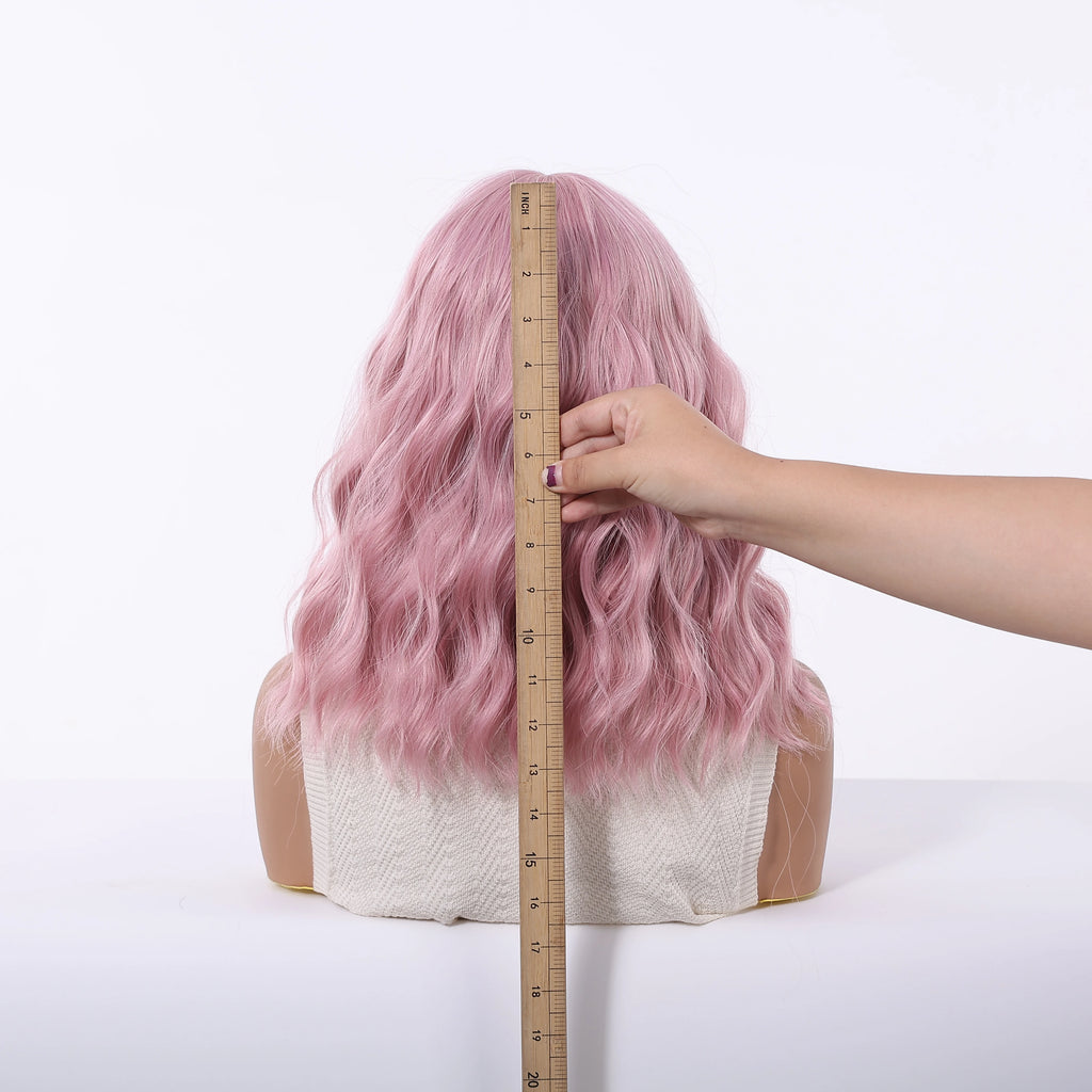 Pink Short Wavy Synthetic Wig with Full Bangs for Women Heat Resistant Natural Look Hair for Daily Party and Cosplay Use